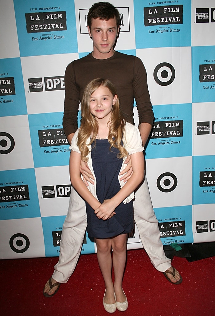 Chloë Grace Moretz keeps her look age-appropriate in a navy dress and cream ballet flats at the 2008 LA Film Festival, while her brother Trevor Duke embraces laid-back California style with flip-flops and relaxed separates