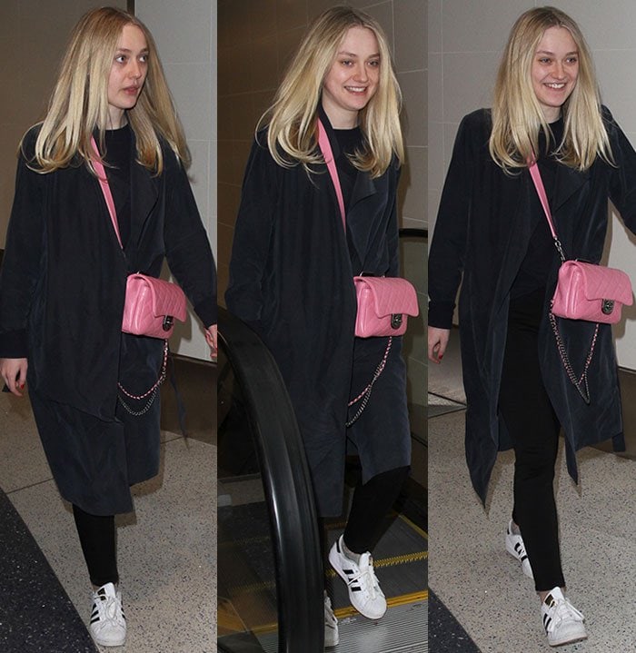 Dakota’s relaxed layering and signature blonde hair give her monochrome ensemble a polished, off-duty feel