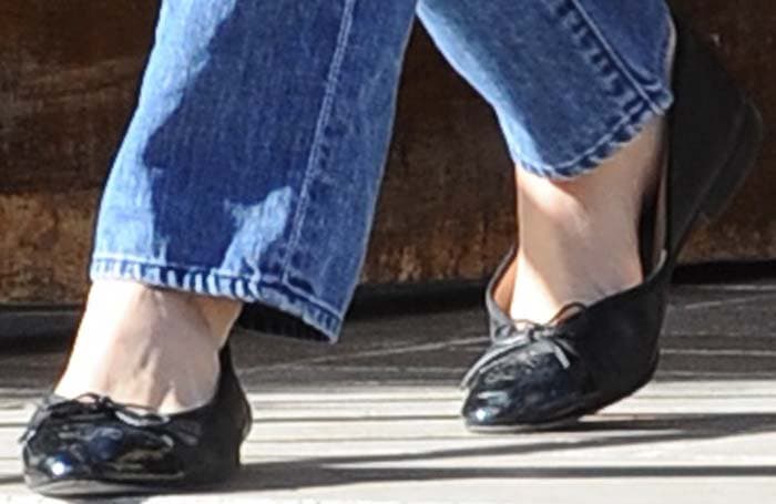 Emmy Rossum's "Cendrillon" black bow flats by Repetto