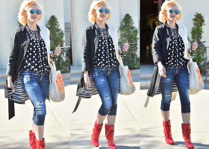 Distressed denim, a monochrome jacket, and vivid red Dsquared2 boots showcased Stefani's ability to blend everyday pieces with statement footwear