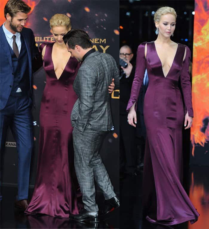 Jennifer Lawrence stuns in a deep-plunge custom Dior gown at the world premiere of The Hunger Games: Mockingjay – Part 2 at Cinestar in Berlin, Germany, on November 4, 2015—though all eyes weren’t necessarily on her dress