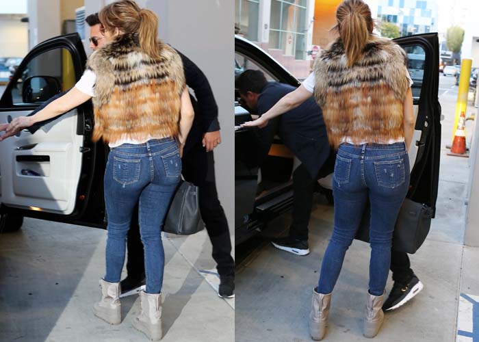 Jennifer Lopez wears a pair of Rag Bone jeans and Yeezy boots while shopping in Beverly Hills