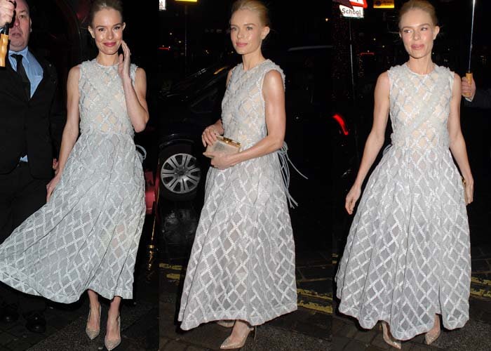 The flowing semi-sheer Simone Rocha design catches the light as Bosworth steps out in London with a metallic Tyler Alexandra clutch and glittering pumps