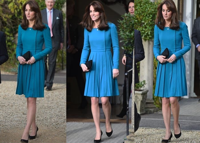 Kate Middleton showcases her timeless style in a vibrant teal dress with pleated detailing, paired elegantly with classic black pumps and a matching clutch