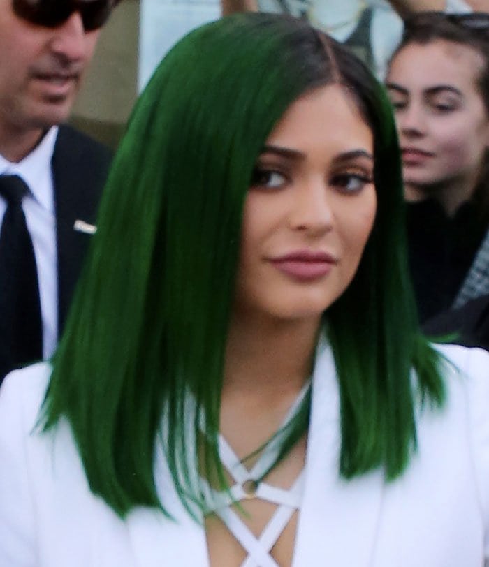 Kylie Jenner debuts her vivid green hair while launching her original Kylie Lip Kits at Dash Boutique in West Hollywood