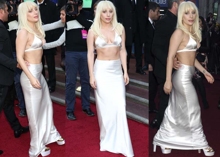 A full-length view shows how Lady Gaga’s sleek ivory skirt skimmed the floor, creating a fluid silhouette balanced by her towering platform heels beneath