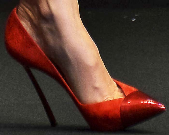 Miranda Kerr shows off her feet in red cap-toe Candylux pumps