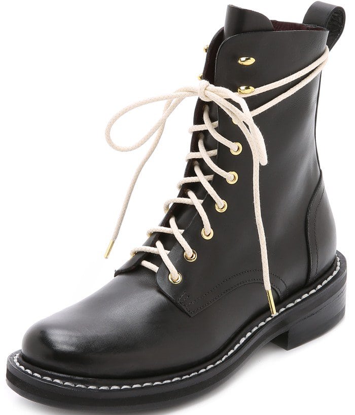 Rag Bone "Emil" boots in a classic combat style, crafted in sturdy leather and fastened with a lace-up closure