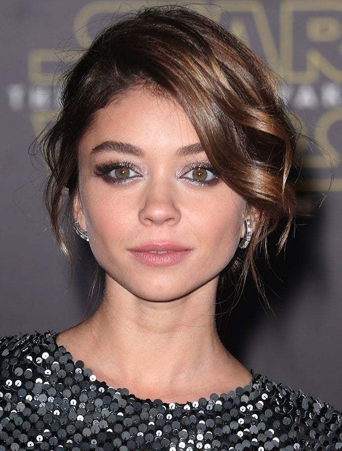 Sarah Hyland rounded out her look with a messy — but chic — updo, and gorgeous makeup