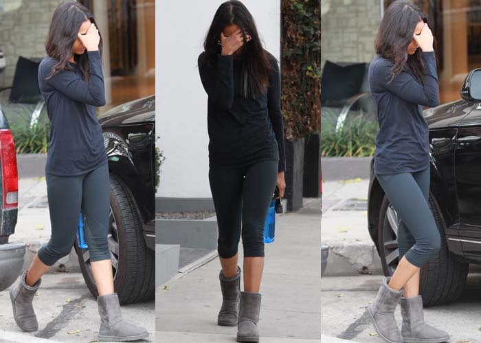 Zoe Saldaña steps out for a morning workout in cozy gray UGG boots, capri-length leggings, and a long-sleeved top, embracing a casual, makeup-free look