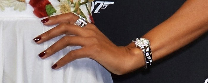 A closer look at Harris’s jewelry reveals a sculptural silver watch and coordinating statement ring