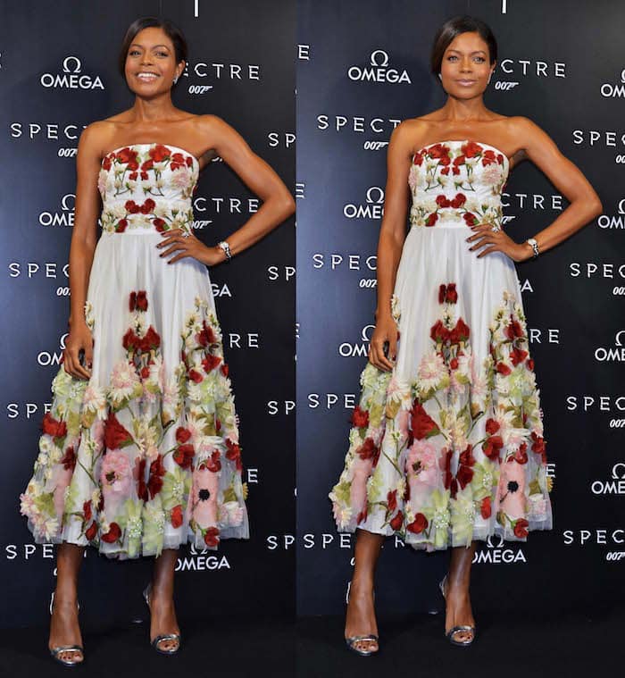 On the black carpet, the actress highlights the dress’s full silhouette and her refined metallic Giuseppe Zanotti slingback heels