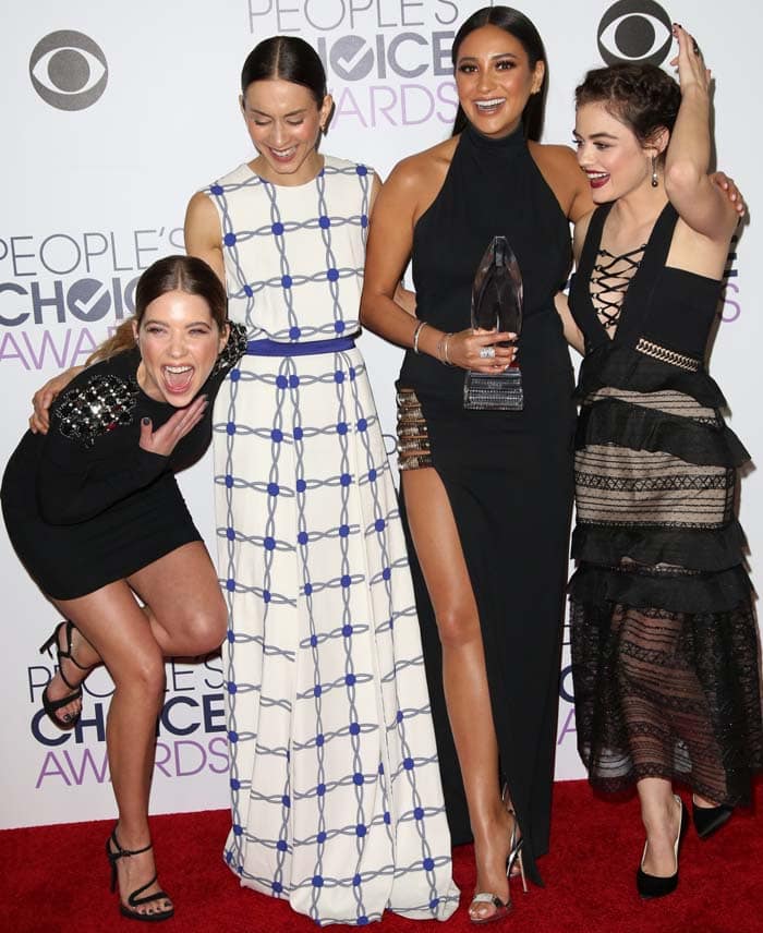 Ashley Benson joined Troian Bellisario, Shay Mitchell, and Lucy Hale on the red carpet at the 2016 People’s Choice Awards, showing off her sculptural Nicholas Kirkwood heels alongside her co-stars’ sleek evening pumps and strappy sandals