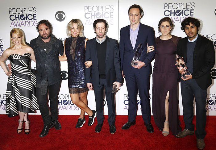(L-R) Melissa Rauch, Johnny Galecki, Kaley Cuoco, Simon Helberg, Jim Parsons, Mayim Bialik and Kunal Nayyar, winners of Favorite Network TV Comedy and Favorite TV Show for 'The Big Bang Theory', pose in the press room at the 2016 People's Choice Awards