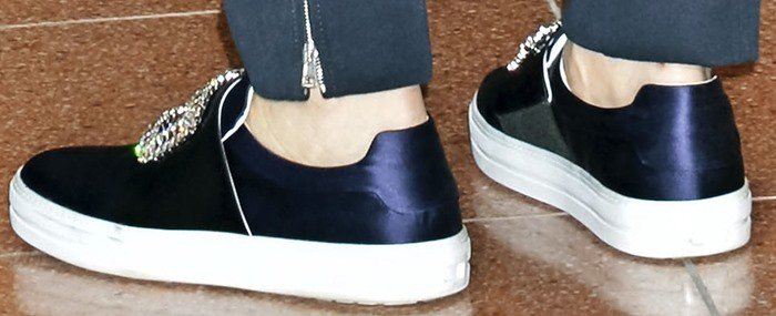 Roger Vivier’s Sneaky Viv slip-ons combine satin-finish uppers, thick rubber soles, and the maison’s signature crystal buckle for a polished take on airport sneakers