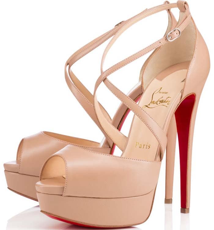 The nude Christian Louboutin Cross Me offers a softer take on the dramatic platform silhouette, retaining the same crisscross straps, peep toe, and signature red sole