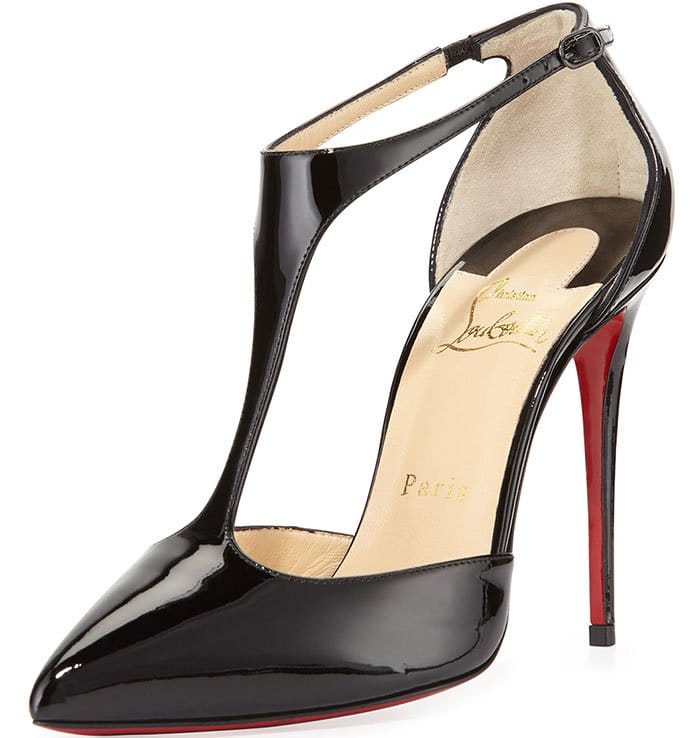 Christian Louboutin's "J String" pump combines a sharply pointed toe with a dramatic patent-leather T-strap, creating an elegant silhouette that elongates the foot while showcasing the brand's signature red sole