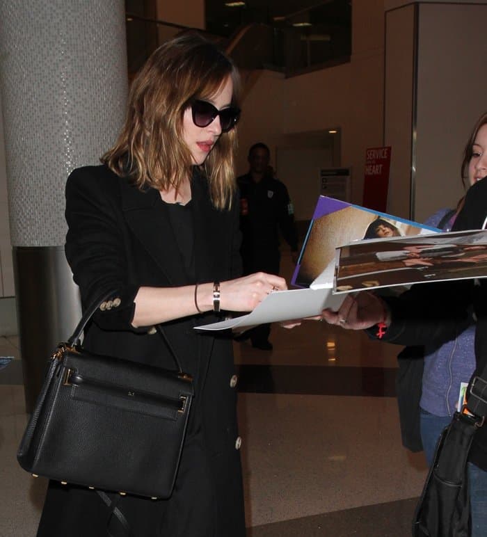 Dakota Johnson wears Kate Young K510 Seka sunglasses