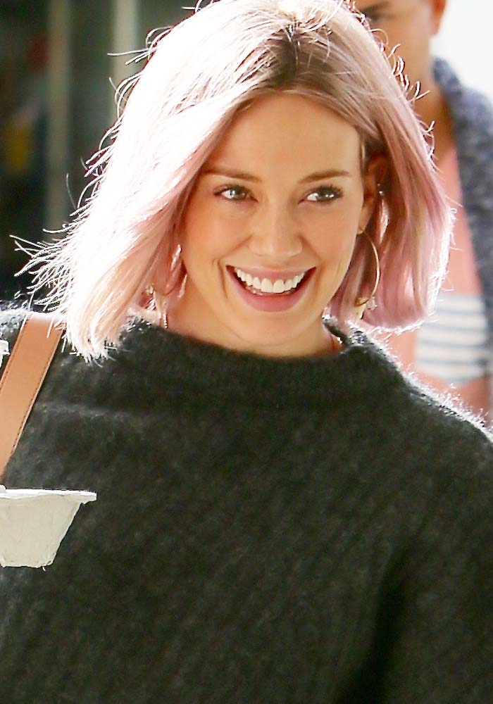 Hilary Duff shows off her new pink hair as she picks up toys at Tom's Toys in Los Angeles