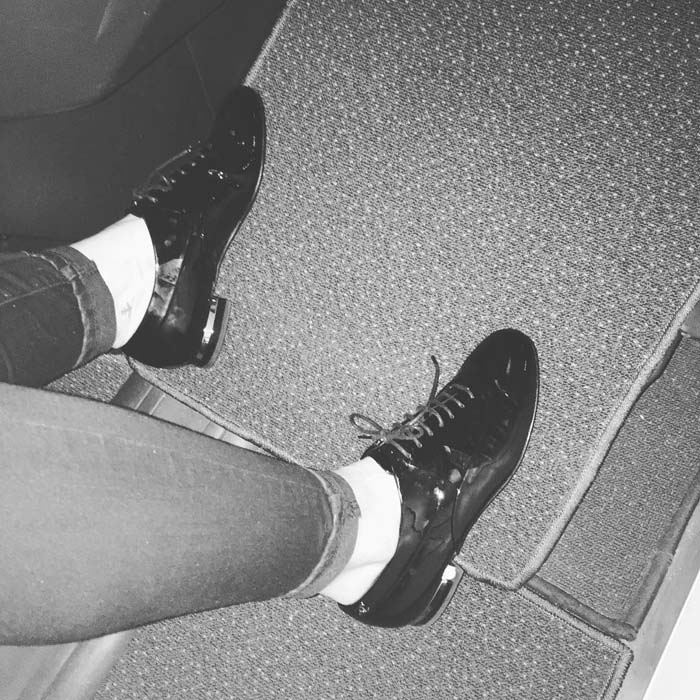 Hilary Duff shared a closer look at her beloved Chanel patent oxfords on social media, highlighting the glossy finish and subtle metal heel detail that made them a staple in her wardrobe