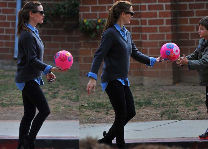 Jennifer Garner keeps it effortlessly chic in black skinny jeans, a layered chambray shirt and sweater combo, and suede Isabel Marant tassel ankle boots while playing catch with her son