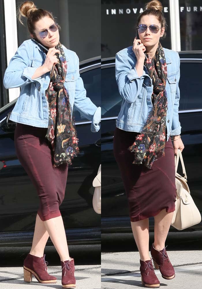 Jessica Biel styled a burgundy dress with a denim jacket