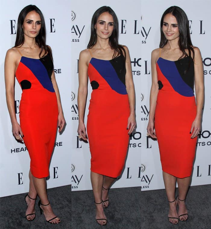 Jordana Brewster lets a bold Victoria Beckham colorblock dress take center stage, pairing it with barely-there black ankle-strap sandals that elongate her silhouette with clean precision