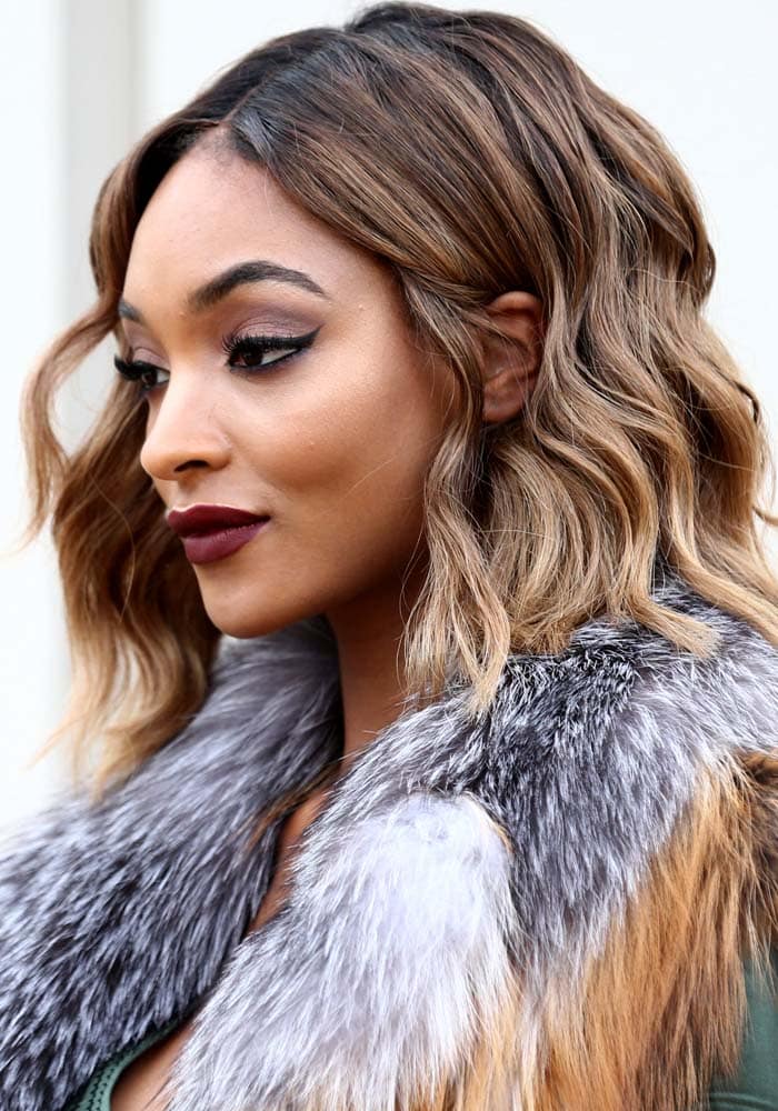 Jourdan Dunn kept warm in a chic fur coat by Burberry