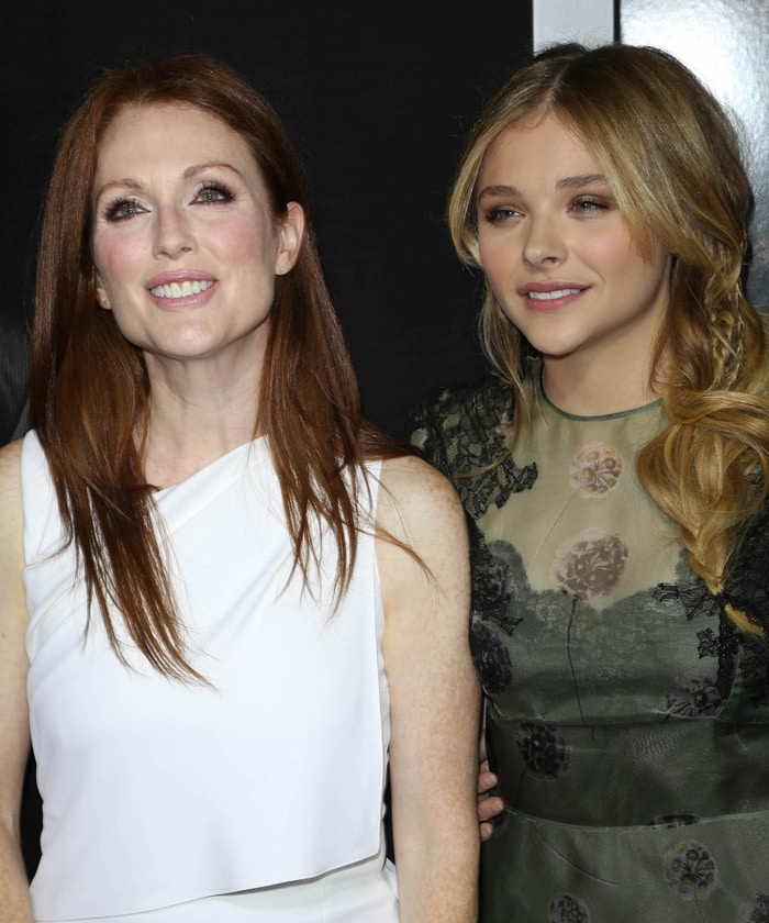 Chloë Grace Moretz and Julianne Moore pose together at the 'Carrie' premiere, showcasing their on-screen chemistry as mother and daughter in the 2013 film