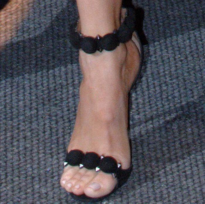 Khloé Kardashian in Glossy Black Embellished Alaïa Sandals Khloé Kardashian's feet in black embellished Alaïa sandals