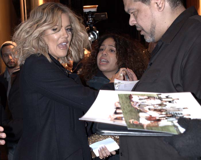Khloé Kardashian interacts with fans at a signing of her new book