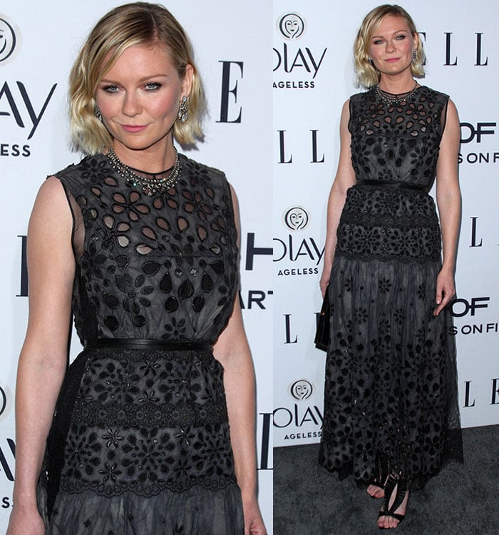 Kirsten Dunst gives a sultry glance at the camera while showing off her smoky eye makeup