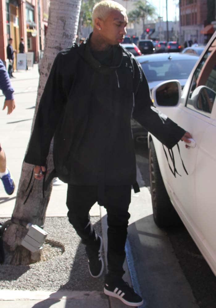 Tyga separately leaves the same building as Kylie Jenner