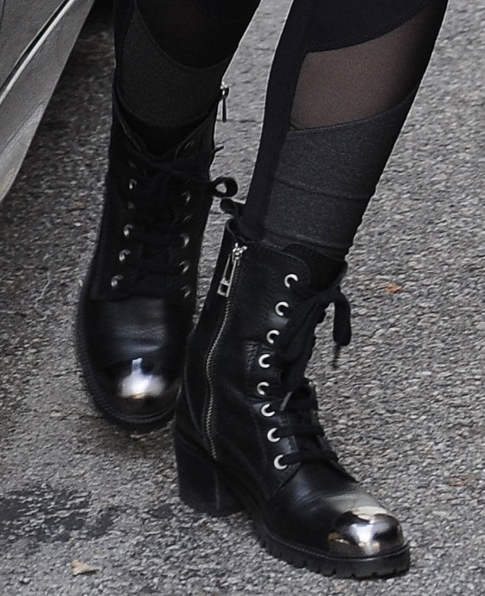 Lily Collins's feet in black Zadig Voltaire boots
