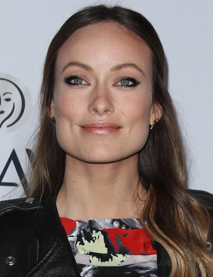 Olivia Wilde shows off her signature cat-eye makeup and soft pink lip at Elle's Women in Television celebration