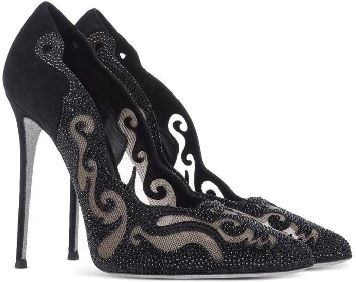 Black René Caovilla pumps shimmer with intricate crystal embellishments over sheer mesh panels, sculpted into elegant swirling patterns atop razor-sharp pointed toes and towering stiletto heels
