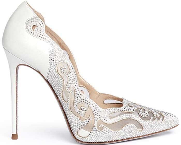 White René Caovilla pumps mirror the same ornate silhouette, featuring delicate crystal-studded scrollwork over translucent mesh for a bridal-ready take on the brand’s signature high-glamour design