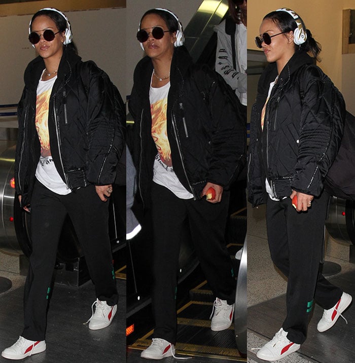 Rihanna keeps it casual in sweats and Beats by Dr. Dre headphones at LAX