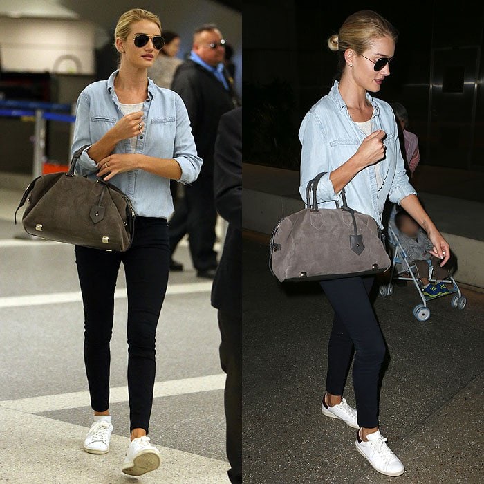 Rosie Huntington-Whiteley elevates airport casual with crisp white sneakers, using them to soften a denim shirt and skinny jeans while traveling through Los Angeles International Airport (LAX) on June 5, 2015