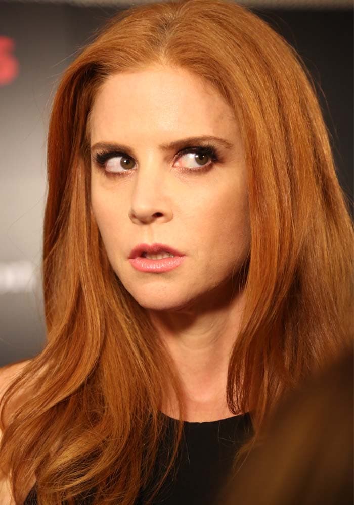 Sarah Rafferty gives a playful sideways glance while discussing how her real-life personality differs from Donna Paulsen at the “Suits” Season 5 premiere