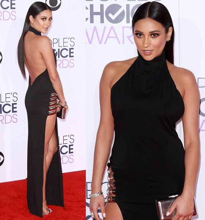 Shay Mitchell wearing her long raven locks sleek straight from a center part