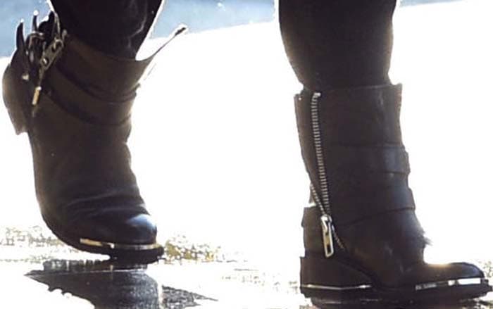 Vanessa Hudgens wears a pair of zippered Dolce Vita boots