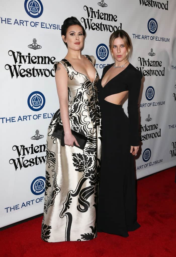 Rumer Willis and Scout LaRue Willis attend Art of Elysium's 9th annual Heaven Gala at 3LABS on January 9, 2016, in Culver City, California — while their shoes aren't visible in the photo, their striking gowns and confident poses stole the spotlight on the red carpet