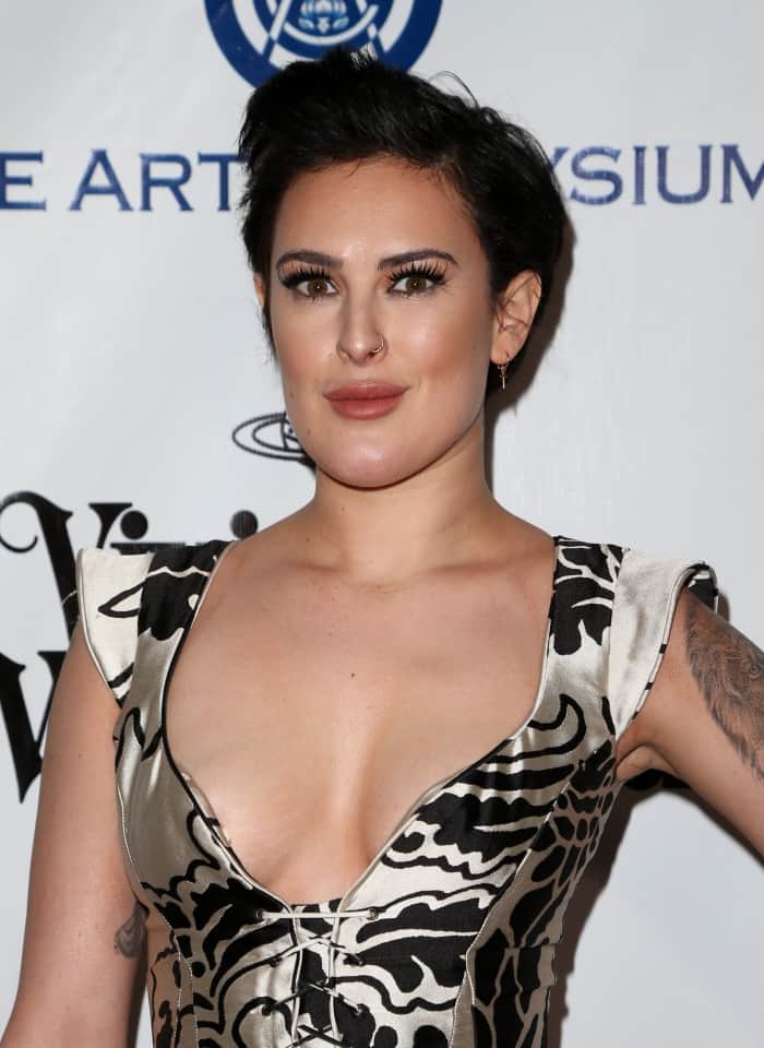 With her dark, tousled hair and edgy nose ring, Rumer Willis captivates with a sultry gaze, her fierce and feminine style taking center stage