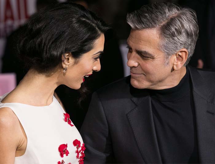 Amal Clooney debuts her convincing faux bob while sharing a warm red-carpet moment with George Clooney