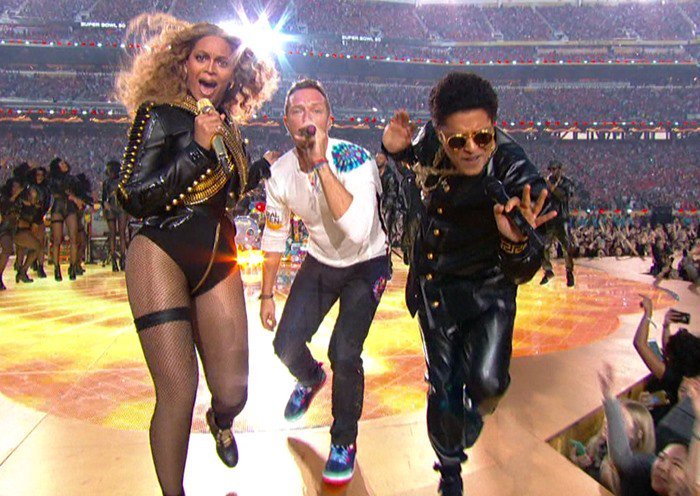 Beyoncé, Chris Martin, and Bruno Mars perform hits like “Uptown Funk” and “Formation” during the unforgettable Super Bowl 50 Halftime Show