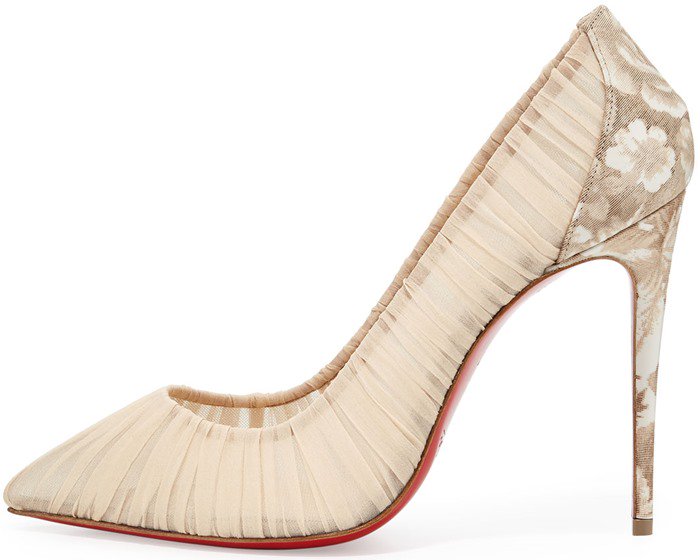 The beige Christian Louboutin Follie Draperia pump pairs softly ruched chiffon with a floral faille heel for a romantic, bridal-ready take on the iconic red sole stiletto