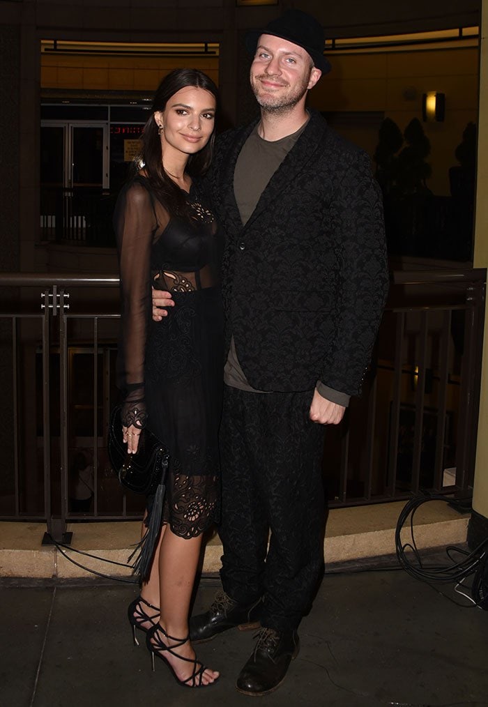 Emily Ratajkowski wore a sheer black Dolce Gabbana dress and strappy heels, while Jeff opted for a unique floral-patterned suit