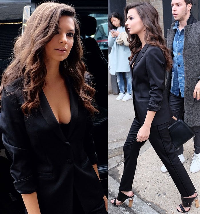 Emily Ratajkowski turned heads in a plunging black tuxedo suit styled with sculptural Hugo Boss sandals featuring clear block heels that subtly elongated her 5ft 5½ frame