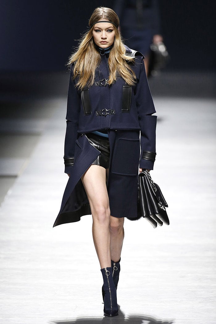 Gigi Hadid modelling the scuba pumps-boots on the Versace fall 2016 fashion show runway.